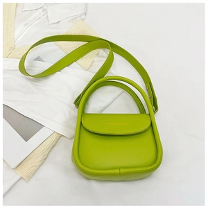 Petit sac carré vert lime avec poignée et inscription Fashion & Bag dorée gravée