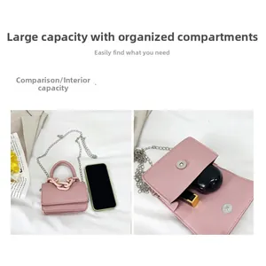 Intérieur du petit sac rose en cuir PU montrant l'espace pour téléphone et rouge à lèvres