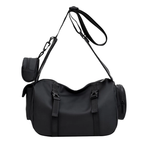 Waterproof black cylindrical sports bag with adjustable strap and mini pouch