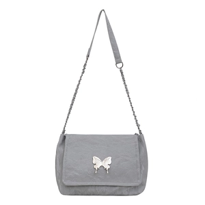 Grey crinkled leather shoulder bag with metallic butterfly buckle and chain strap