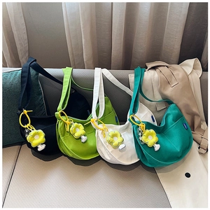 Sacs fourre-tout en toile minimalistes en quatre couleurs avec pendentif fleur jaune