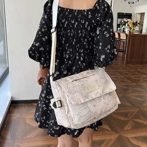 Waterproof nylon messenger bag with retro cartoon bear print for casual travel
