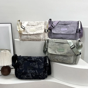 Waterproof nylon tote bags with bear print patterns in four colors for travel and school