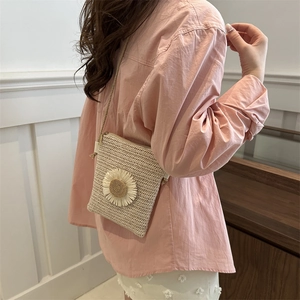 Straw woven phone crossbody bag with large sunflower detail for summer fashion style