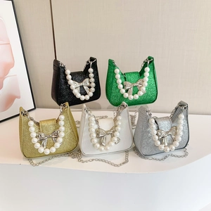 Sparkly sequin mini saddle bags with pearl handles and bow decor in five colors