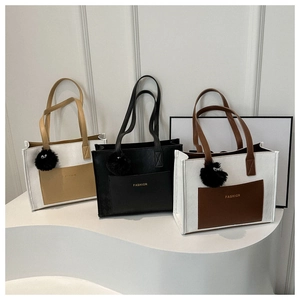 Three minimalist large capacity tote bags with FASHION lettering and plush eye charm
