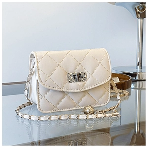 Close-up of quilted PU leather crossbody bag with silver twist lock and chain strap