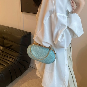 Sparkling light blue sequined evening clutch with gold metal handle for wedding parties