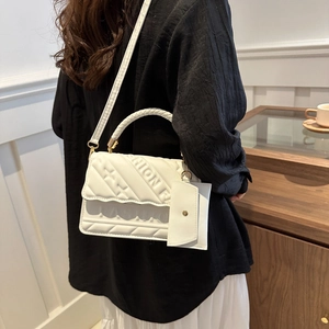 White star quilted crossbody bag with top handle and mini pouch for women