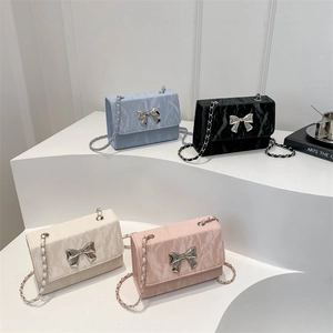 Elegant butterfly mini crossbody bags with marble texture and chain straps in four colors