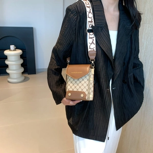 Retro plaid crossbody bag with brown leather flap and stylish woven shoulder strap
