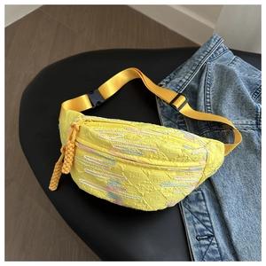 Yellow vintage dumpling crossbody bag with colorful embroidery and adjustable strap