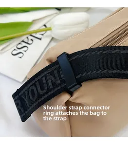 Detail of high-density nylon strap with YOUNG jacquard and black connection ring