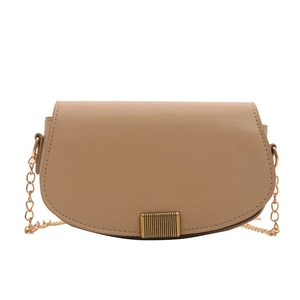 Minimalist beige saddle shoulder bag with gold textured buckle and metal chain strap
