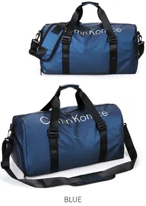 Sac de voyage sport cylindrique bleu foncé en nylon imperméable avec bandoulière