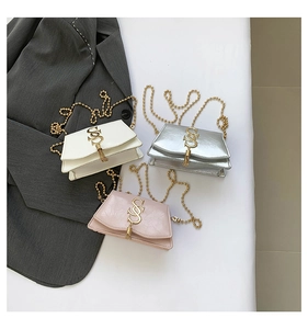 Detailed trio of mini crossbody bags with gold SS logo and chain in white, silver and pink
