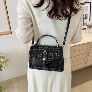 Elegant black tweed shoulder bag with gold thread accents and metal clasp for women