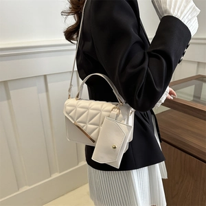 Minimalist white quilted shoulder bag with gold metal detail and matching pouch for women
