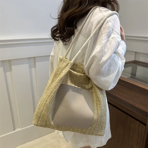 Large capacity straw tote bag with leather patch and rope handles for beach vacation