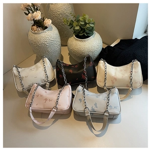 Chic butterfly print crossbody bags in five colors with silver chain straps and fabric handles