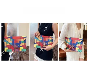 Three ways to carry the geometric envelope clutch with gold metal buckle closure
