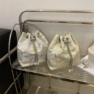 Hanfu style jacquard bucket bag with butterfly embroidery and pearl chain strap