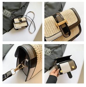 Close-up of woven straw bag with tricolor plaid trim and gold buckle details