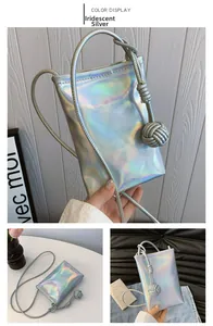 Iridescent silver mini crossbody phone bag with woven charm and slender shoulder strap