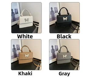 Vue détaillée de quatre sacs à main minimalistes avec fermoir papillon en quatre couleurs