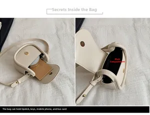 Interior detail of a cream saddle bag showing storage for phone, keys, and lipstick