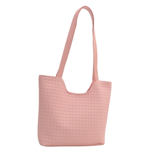 Pink woven fabric tote bag with textured finish and long straps in a side view