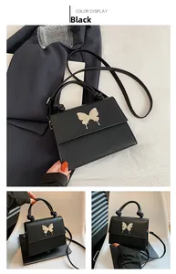 Détails du sac carré noir en PU mat avec boucle papillon argentée et lanière à nœuds