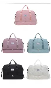 Detailed view of quilted travel bags in various colors with separate shoe compartments