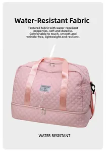 Water resistant pink quilted travel bag showing liquid repelling on durable nylon fabric