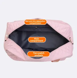 Pink quilted travel bag interior showing dry-wet separation pocket and large storage compartments