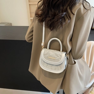 Minimalist white pleated leather saddle bag with gold metal buckle for daily wear