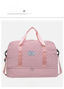 Close-up of pink quilted travel bag showing waterproof nylon and bottom shoe compartment