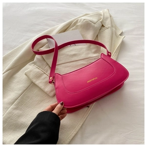 Close-up of rose red PU leather baguette bag with JINGPINPIJU logo and shoulder strap