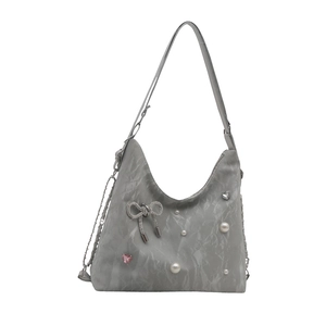 Chic grey underarm bag with rhinestone butterfly pendant and pearl heart charms