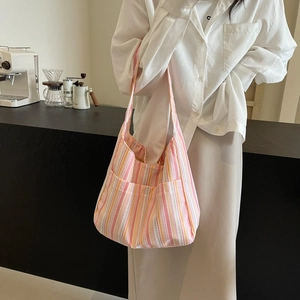 Pink and orange striped nylon hobo bag with large capacity and side pockets for casual use