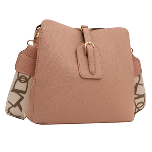 Pink lychee leather bucket bag with wide jacquard strap and gold buckle detail