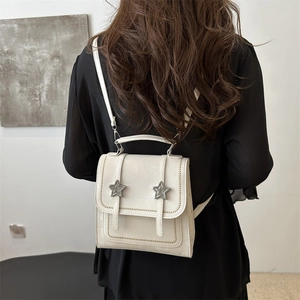 Minimalist cream white mini star backpack with leather texture and silver star buckles