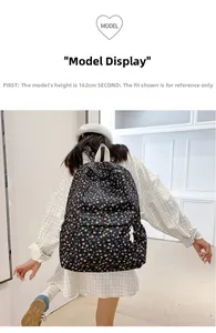 Floral backpack back view on a 162cm model showing pink and blue flower patterns