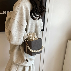 Chic dark grey box crossbody bag with pearl handle and drawstring satin lining