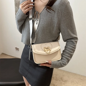 Cream crossbody small square bag with heart lock and wide contrast canvas strap