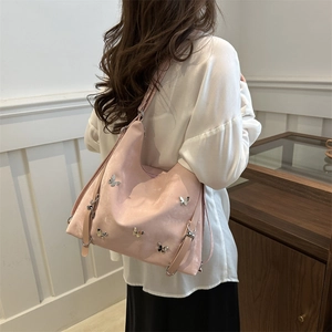 Sac fourre-tout rose minimaliste pour femme avec papillons argentés et sangles latérales
