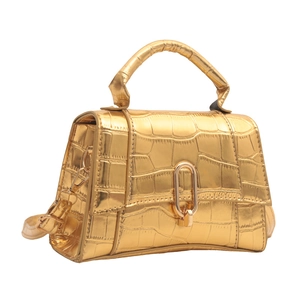 Glossy gold crocodile pattern handbag with signature curved base and metal buckle