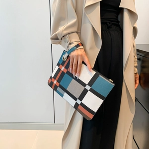 Fashionable color-block geometric pattern envelope clutch with stylish leather wrist strap