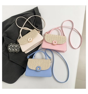 Detailed view of woven contrast拼接 square bags in cream, pink and light blue colors
