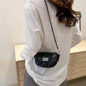 Classic black quilted mini chain bag with silver twist lock and crossbody strap